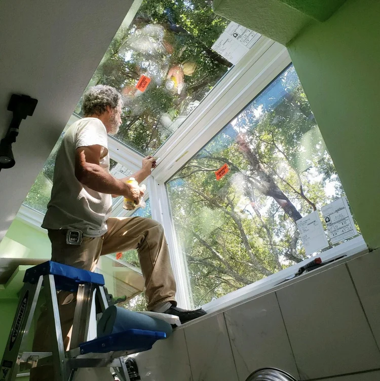 Artisan replacement window installation